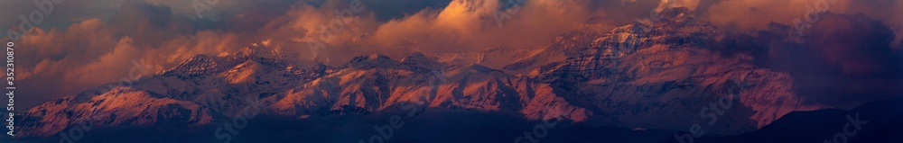 beautiful panoramic of the los andes mountains and clouds in the sky (Santiago, Chile)