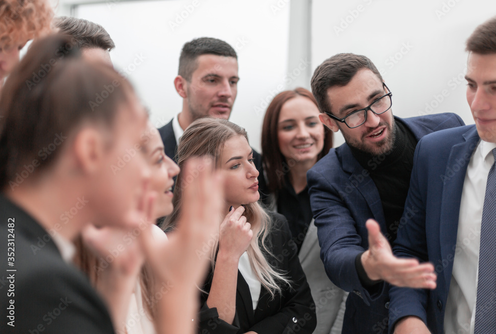 business team discussing the announcement on the Board business team discussing the announcement on the Board