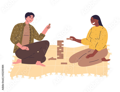 Young man and woman plays a table game called jenga.Tower balance game.Wooden stack risk block toy for two or more persons.Flat cartoon characters isolated on white background.Vector illustration.