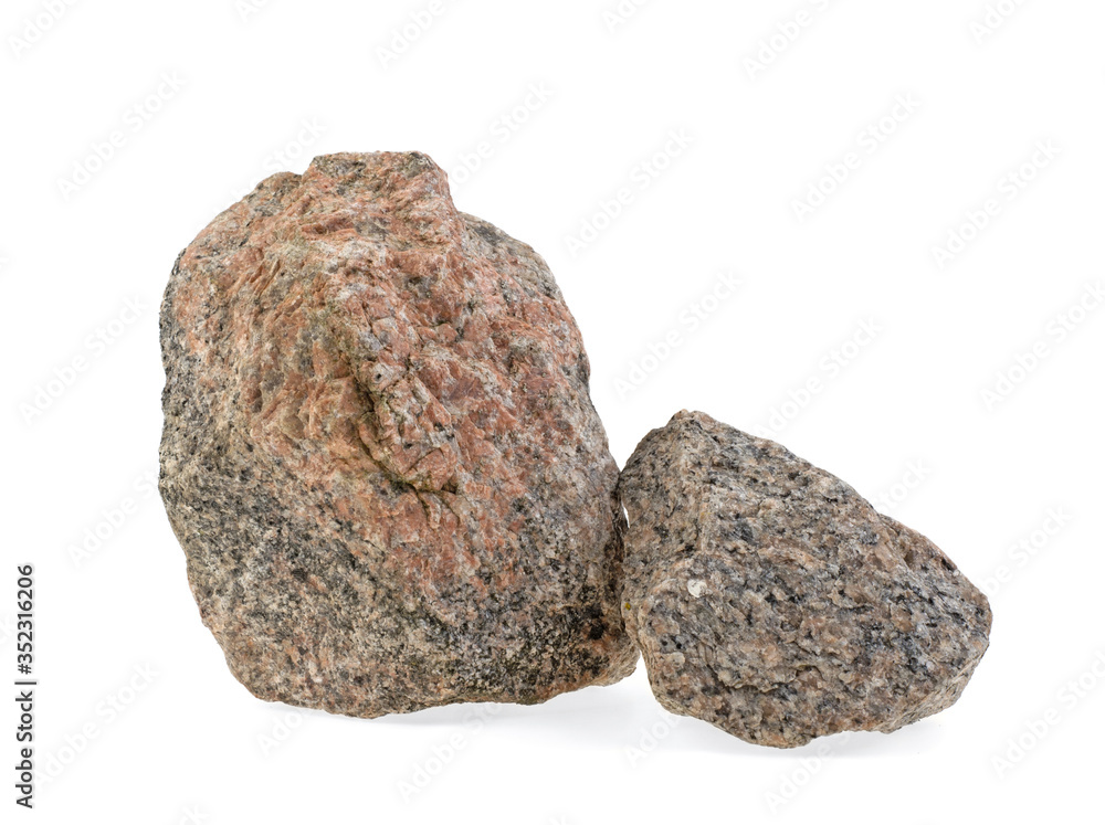 Natural granite stone on a white background, isolated. Natural granite stone on a white background, isolated.