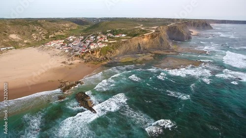 Aerial video shooting. Monte Clerigo surf beach on the Atlantic coast. Portugal, Aljezur, Sagres, Algarve, next to the Costa Vicentina.