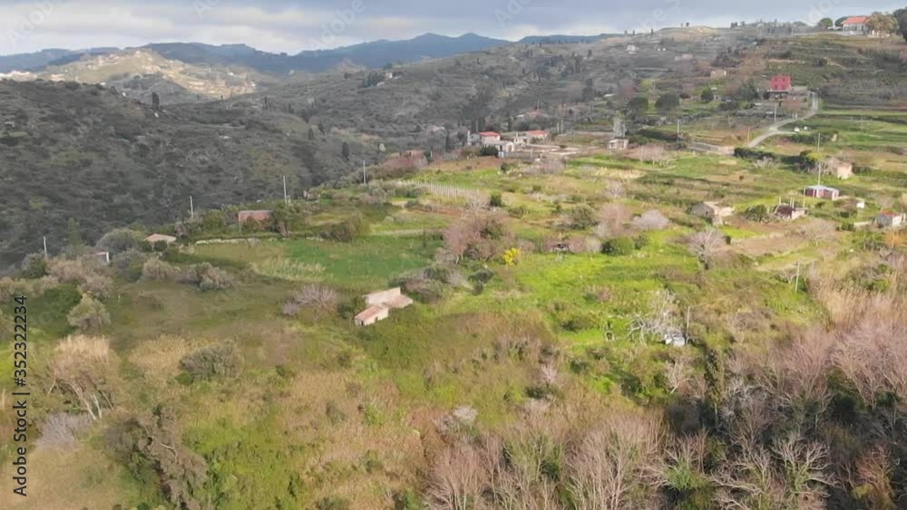 Aerial video of the Mediterranean coast of Sicily with green meadows, forest, houses, roads near Palermo, Italy. Beautiful landscape with a quiet Italian village in the south of Europe Aerial video of the Mediterranean coast of Sicily with green meadows, forest, houses, roads near Palermo, Italy. Beautiful landscape with a quiet Italian village in the south of Europe