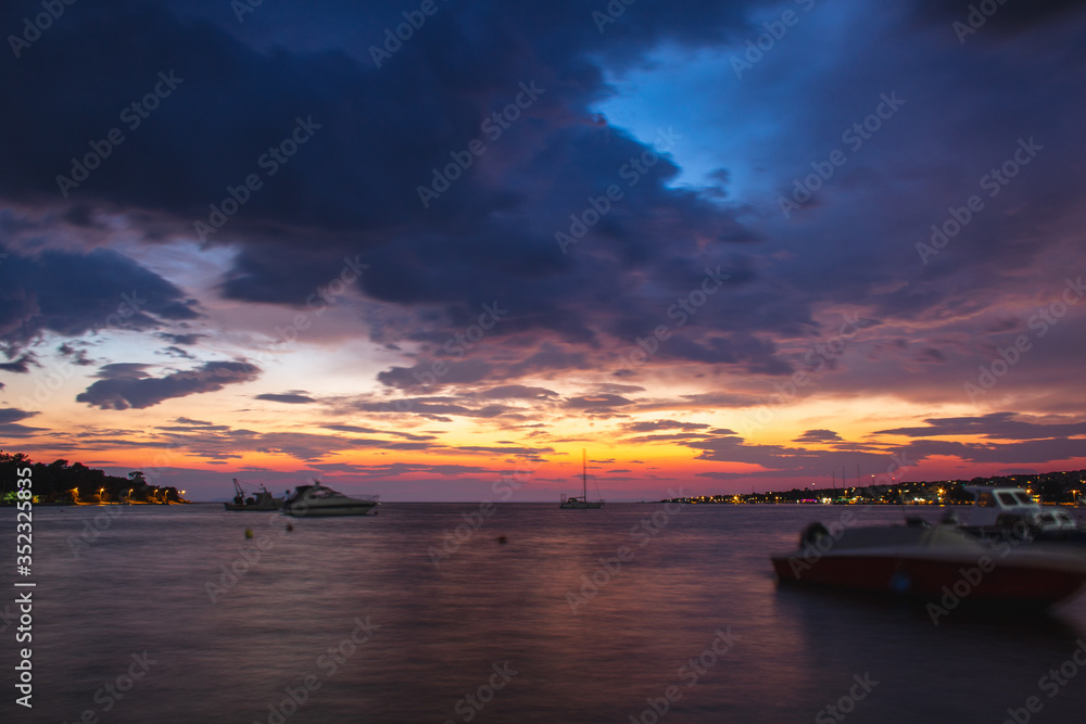 Colorful coastal view of Novalja waterfront at sunset. Pag Island, Croatia