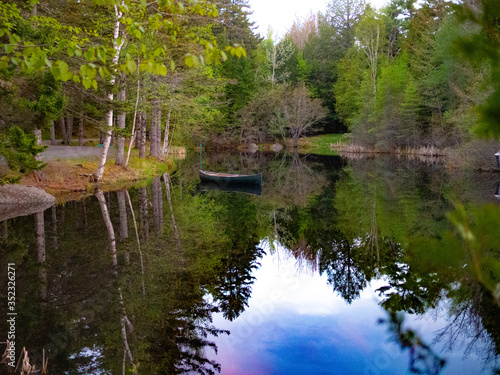 Canoe on a pond by the side of the road Pretty Marsh Bar Harbor Maine