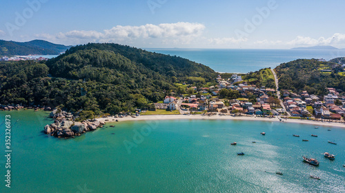 Aerial view of Armação da Piedade beach (Praia da Armação da Piedade) - Governador Celso Ramos. Historical and beatiful beach in Santa Catarina, Brazil
