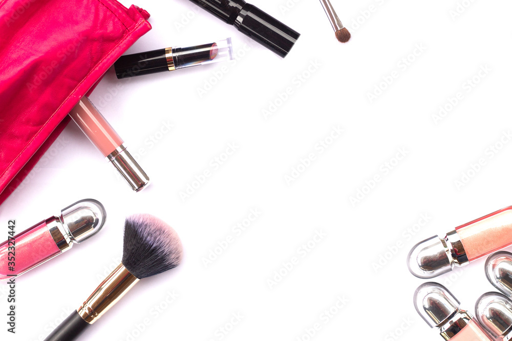 Makeup bag with a set of cosmetics on a white background close-up Makeup bag with a set of cosmetics on a white background close-up