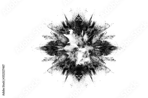 particles of charcoal on white background abstract powder splatted on white background Freeze motion of black powder exploding or throwing black powder.