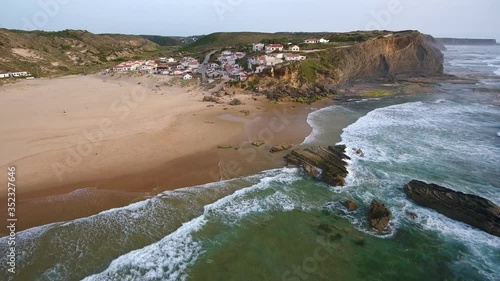 Aerial video shooting. Monte Clerigo surf beach on the Atlantic coast. Portugal, Aljezur, Sagres, Algarve, next to the Costa Vicentina.