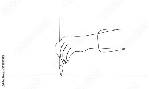 Hand holding pen, pencil and drawing. Continuous one line drawing