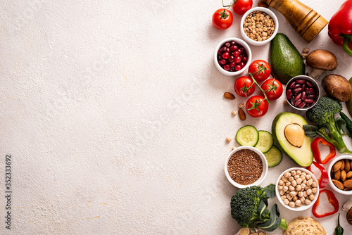 Healthy foods for vegetarians. Vegetables and fruits, cereals for vegan. Top view Copy space. Object on the right.