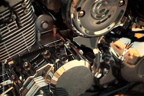 motorcycle close-up. beautiful chrome details. gold tinted photo