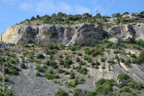 Limestone cliffs with sample of material  limestone erosion in the rocks.