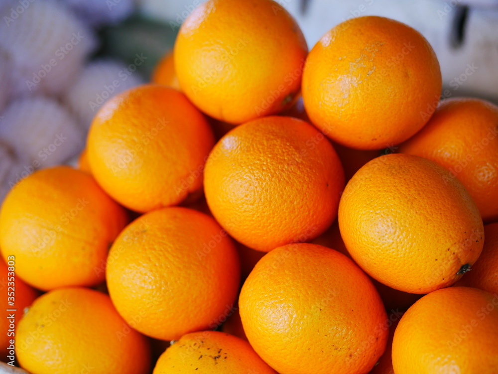 Tangerines in the market. Ripe fruit for vegetarians. Vitamins and natural food. Tangerines in the market. Ripe fruit for vegetarians. Vitamins and natural food.