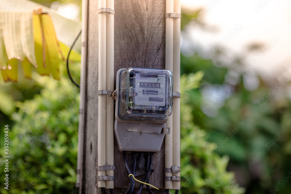 Blurred background of electricity meters that measure energy in houses or condominiums Blurred background of electricity meters that measure energy in houses or condominiums