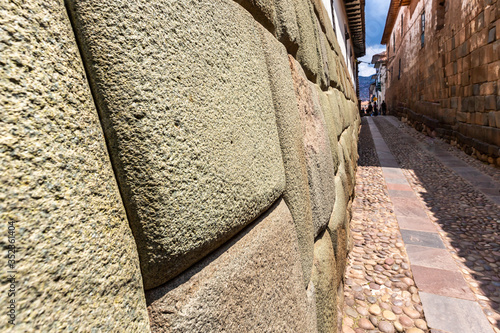 Twelve angles stone, Beautiful narrow street and buildings wall in centre of Cusco or Cuzco city, Peru photo