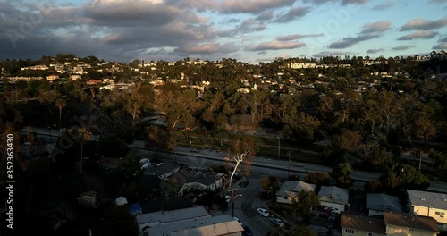 Interstate 110-Freeway in Los Angeles, with almost no traffic during lockdown amidst the coronavirus pandemic. Aerial drone tracking towards highway, Ernest E. Debs Park and Monterey Hills photo