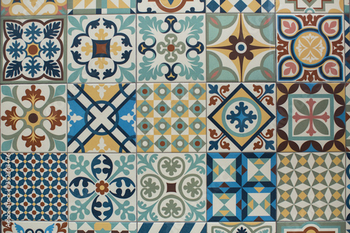 Traditional old tiles wall, painted tin-glazed, azulejos ceramic tilework in Porto, Portugal..