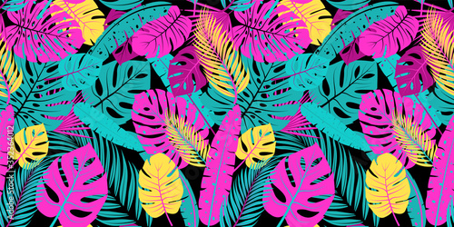 Seamless pattern with tropical leaves. Vector design
