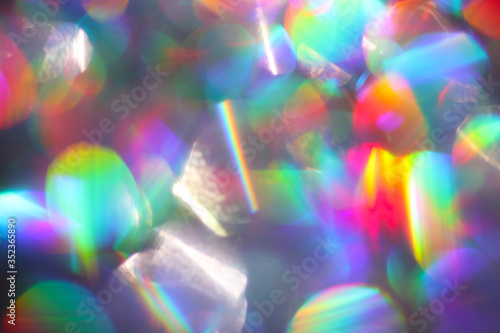 Abstract color bokeh. Defocused gradient background. Multicolored sparkling unusual blur. Rainbow glare