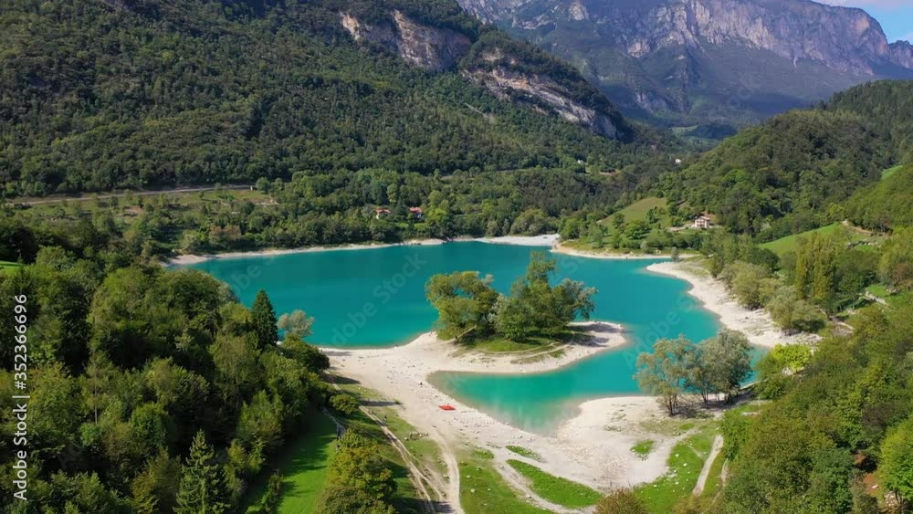 Aerial video with drone, view of the beautiful Lake Tenno in summer,Turquoise lake in the mountains,Trento,Italy, Europa. Aerial video with drone, view of the beautiful Lake Tenno in summer,Turquoise lake in the mountains,Trento,Italy, Europa.