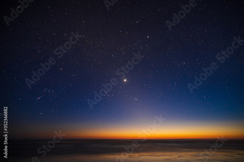Fototapeta Naklejka Na Ścianę i Meble -  Starry sky, planet Venus, sunset landscape of the Pacific Ocean