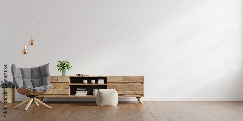 Interior of a bright living room with armchair on empty white wall background. - obrazy, fototapety, plakaty 