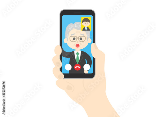 テレビ電話をするビジネスマンのイラスト