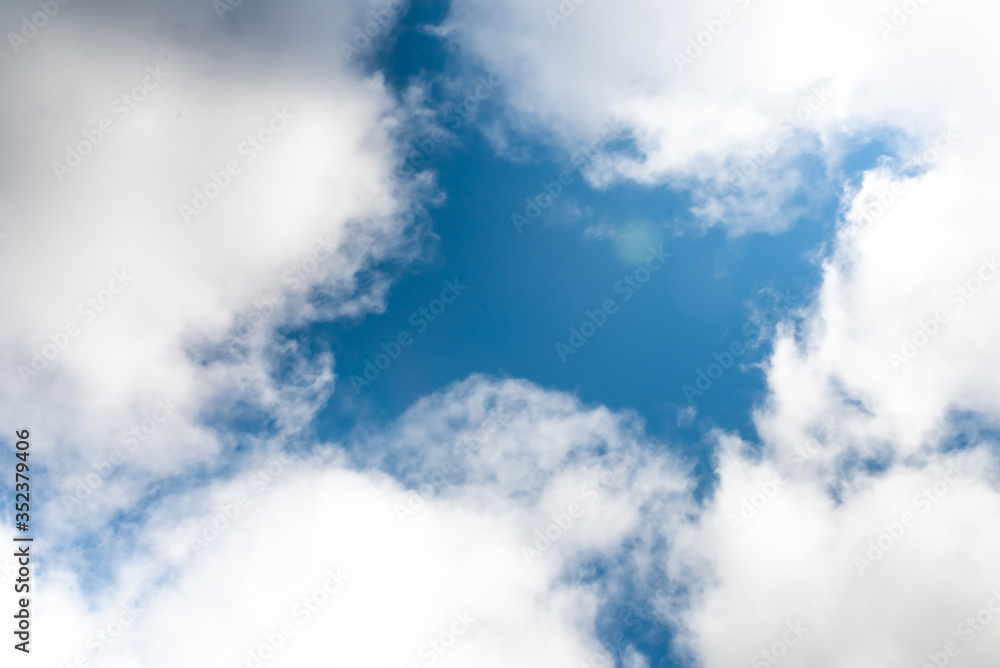 Obraz premium Beautiful sky with volumetric clouds, and the rays of the sun.