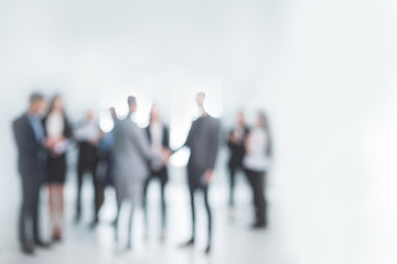 background image of a group of business people in the office lobby