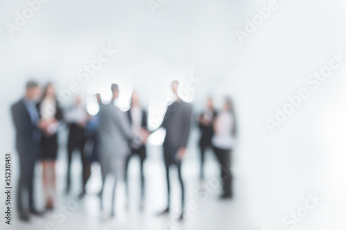 Obraz na płótnie background image of a group of business people in the office lobby w salonie