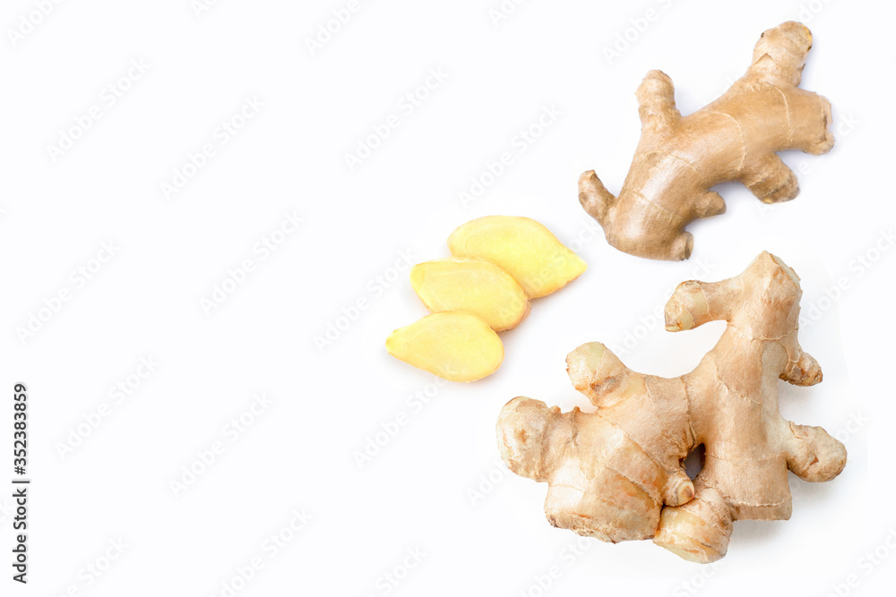 Closeup fresh organic ginger root with slice isolated on white background. Copyspace for text. Top view. Flat lay. Closeup fresh organic ginger root with slice isolated on white background. Copyspace for text. Top view. Flat lay.