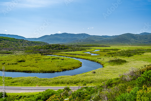 Scenic green hills and winding Darby River at Wilsons Prom National Park in Australia
