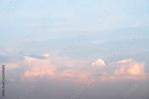 Orange cloudy and blue sky background