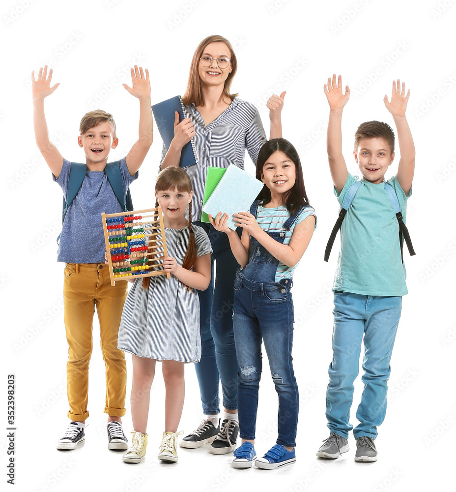 Obraz premium Happy little pupils with math teacher on white background