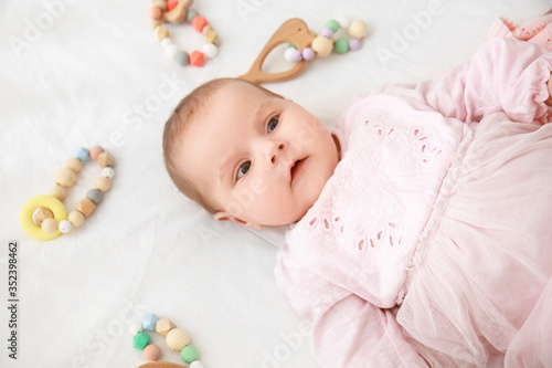 Cute little baby lying in crib