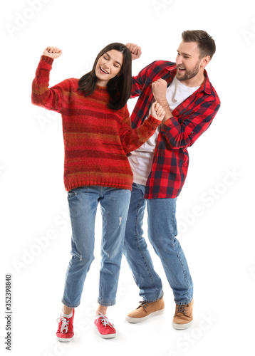 Happy young couple dancing ...
