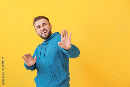 Handsome young man dancing ...