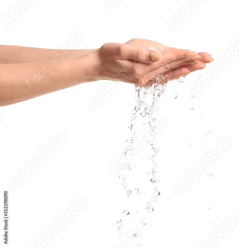 Woman washing hands against white background