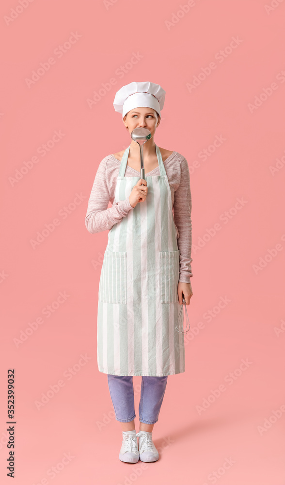 Beautiful female chef on color background Beautiful female chef on color background