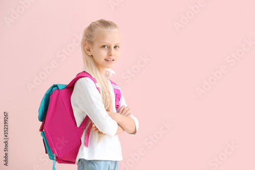 Cute little schoolgirl on c...