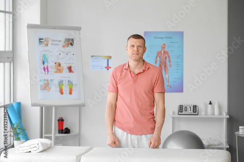 Portrait of massage therapist in medical center