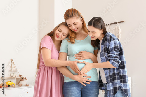Lesbian couple and pregnant...