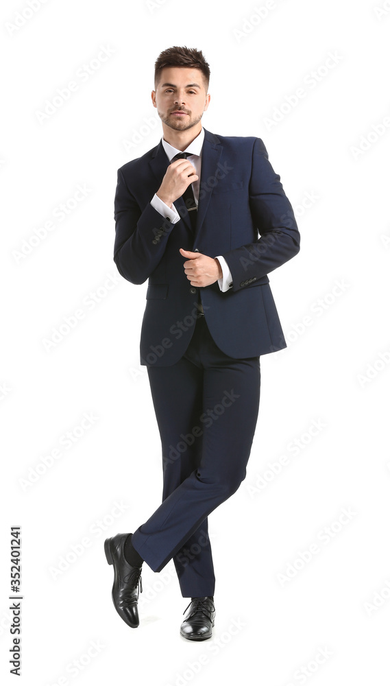 Handsome young man in elegant suit on white background Handsome young man in elegant suit on white background