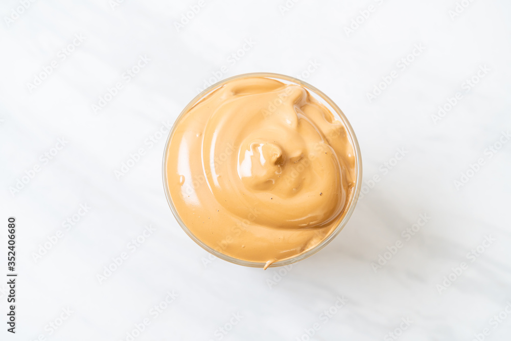 Iced Dalgona Coffee, a trendy fluffy creamy whipped coffee Iced Dalgona Coffee, a trendy fluffy creamy whipped coffee