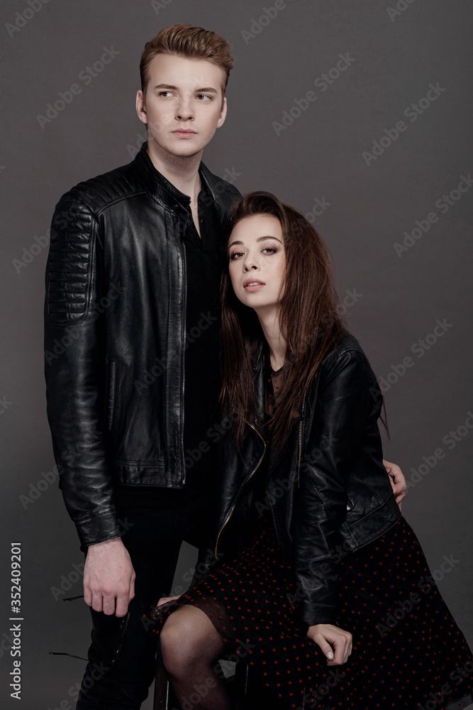 cool man and woman on gray background cool man and woman on gray background