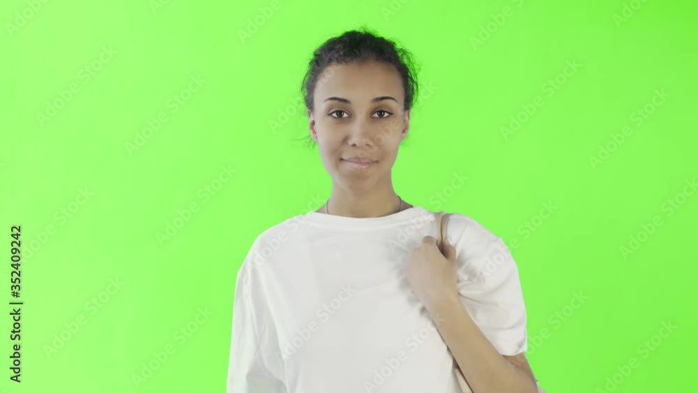 Afro-American Girl Activist With plastic and glass cups on chroma key background Afro-American Girl Activist With plastic and glass cups on chroma key background