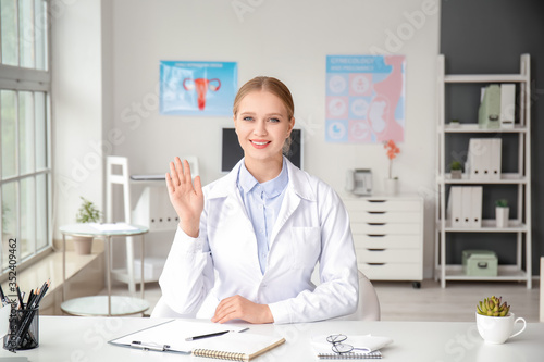 Female doctor giving a cons...