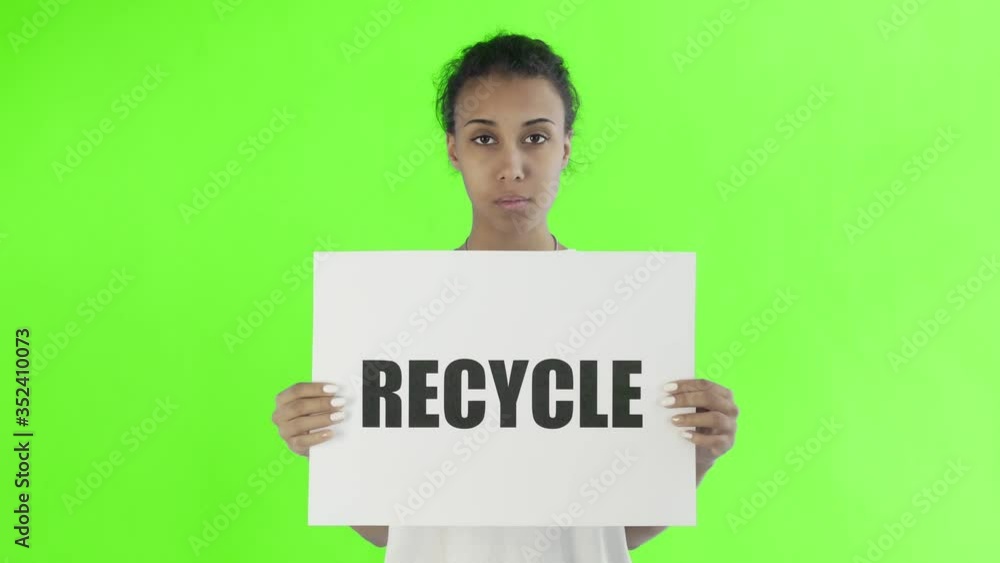 Afro-American Girl Activist With Recycle Poster on chroma key background Afro-American Girl Activist With Recycle Poster on chroma key background