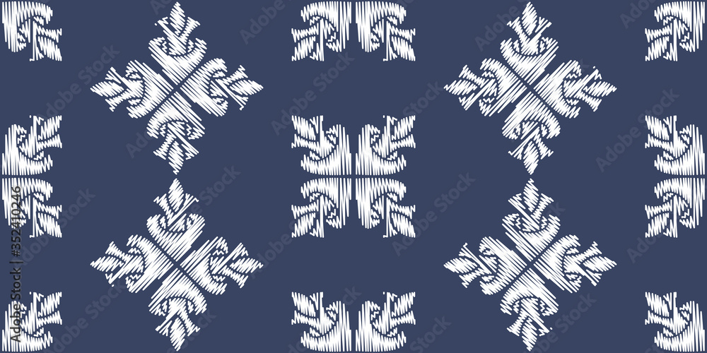 Uzbek ikat silk fabric pattern, motif ethnic indigo blue and white colors. Tite repit pattern Uzbek ikat silk fabric pattern, motif ethnic indigo blue and white colors. Tite repit pattern