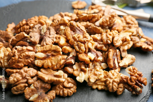 Tasty walnuts on table, closeup